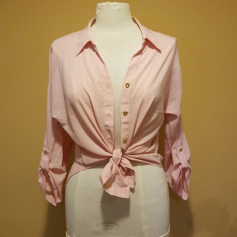 Pink blouse with cut out back